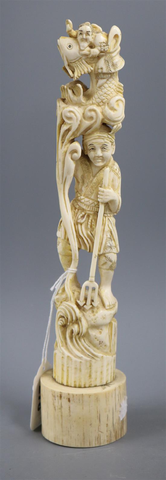 An early 20th century Japanese walrus ivory okimono Height 31.5cm